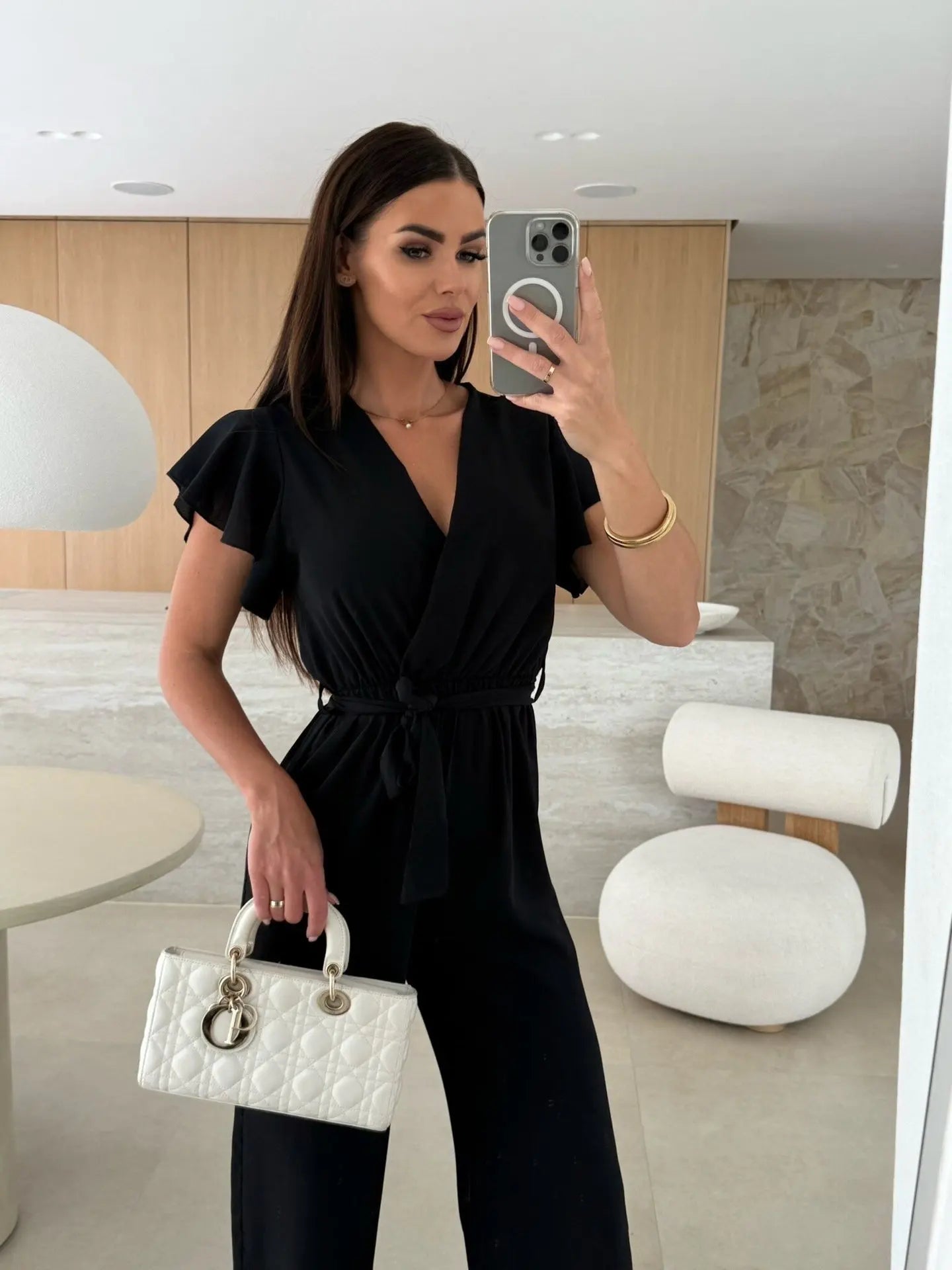 Jumpsuit donna nera scollo V manica a volant vita alta elegante