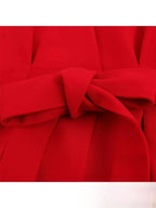 Completo donna dettaglio pantaloni a zampa