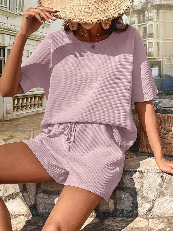 Completo donna manica pipistrello lilla - vista frontale con fiocco e pantaloncini drawstring